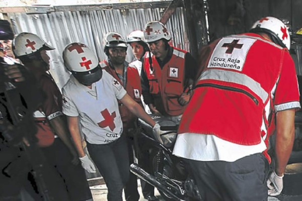 Matan a tres hombres al interior de un taller de motocicletas en Tegucigalpa