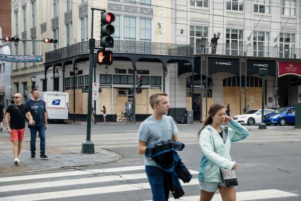 Shops and businesses have boarded up their store fronts in the French Quarter in preparation for Hurricane Nate in New Orleans on October 07 2017.Residents in three states along the US Gulf Coast scrambled to complete preparations Saturday ahead of Hurricane Nate as officials warned conditions would turn treacherous after sunset. Nate was forecast to arrive late Saturday as a Category Two hurricane, packing winds topping 90 miles per hour as it churned in the Gulf of Mexico. The storm killed at least 28 people in Central America. / AFP PHOTO / Bryan Tarnowski