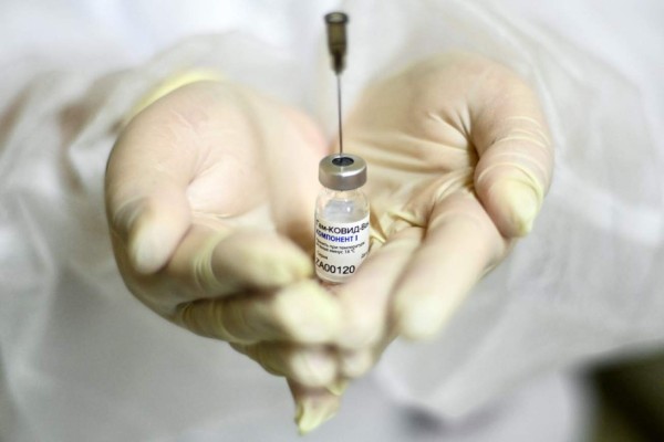Persisten desacuerdos en torno a derechos sobre vacunas contra covid-19