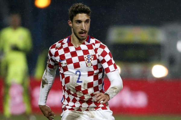 Croatia's defender Sime Vrsaljko celebrates his team's victory at the end of the Russia 2018 World Cup semi-final football match between Croatia and England at the Luzhniki Stadium in Moscow on July 11, 2018. / AFP PHOTO / Alexander NEMENOV / RESTRICTED TO EDITORIAL USE - NO MOBILE PUSH ALERTS/DOWNLOADS