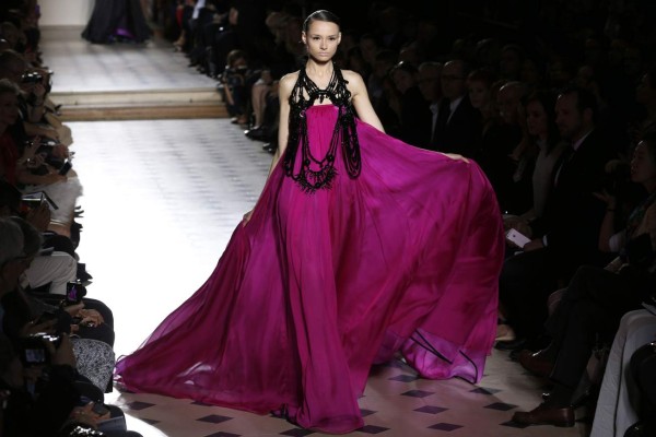 A model presents a creation by Julien Fournie during the 2014/2015 Haute Couture Fall-Winter collection fashion show on July 8, 2014 in Paris. AFP PHOTO / FRANCOIS GUILLOT