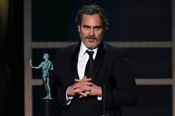 US actor Joaquin Phoenix accepts the award for Outstanding Performance by a Male Actor in a Leading Role during the 26th Annual Screen Actors Guild Awards show at the Shrine Auditorium in Los Angeles on January 19, 2020. (Photo by Robyn Beck / AFP)