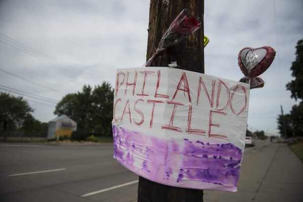 (FILES) This file photo taken on July 7, 2016 shows a memorial left for Philando Castile following the police shooting death of the black man in Falcon Heights, Minnesota.A jury in Minnesota on June 16, 2017, acquitted police officer Jeronimo Yanez, who fatally shot 32-year-old African American Philando Castile, in an incident caught in Facebook video that shocked the nation. Yanez, 29, was found not guilty on three charges: second-degree manslaughter and two felony counts of intentional discharge of a dangerous weapon, for endangering the safety of Castile's girlfriend Diamond Reynolds and her four-year-old daughter. Both were in the car when the officer shot Castile during a traffic stop. / AFP PHOTO / GETTY IMAGES NORTH AMERICA / Stephen Maturen