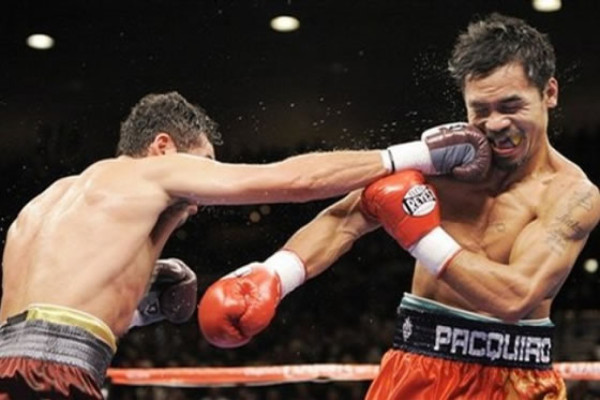 Óscar de la Hoya anuncia su retiro del boxeo