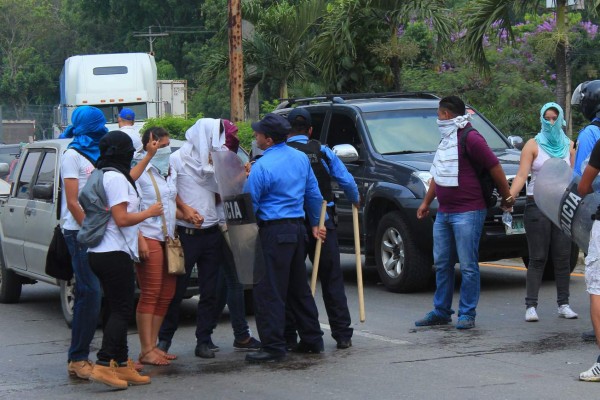 Estudiantes detenidos en protesta enfrentan juicio expedito por dos delitos