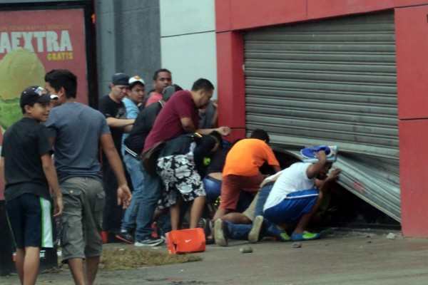 Inician procesos judiciales contra saqueadores de negocios en San Pedro Sula