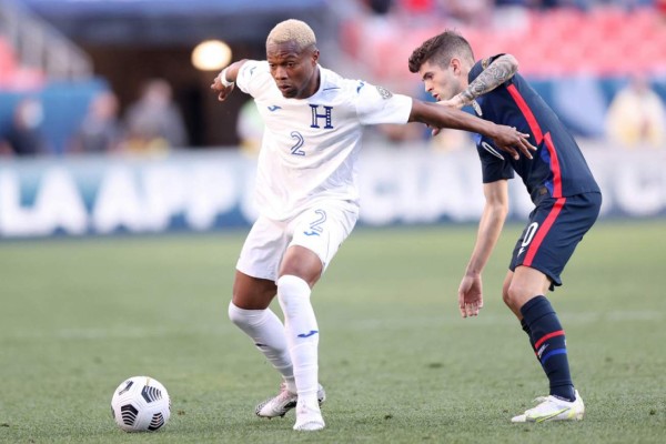 DENVER, COLORADO - JUNE 03: Kevin Alvarez #2 of Honduras fends off Christian Pulisic #10 of USA in the second half during Game 1 of the Semifinals of the CONCACAF Nations League Finals of at Empower Field At Mile High on June 03, 2021 in Denver, Colorado. Matthew Stockman/Getty Images/AFP (Photo by MATTHEW STOCKMAN / GETTY IMAGES NORTH AMERICA / Getty Images via AFP)