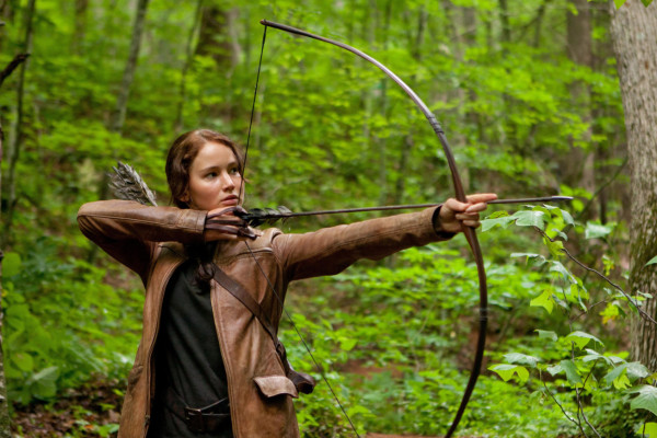 Arco y flechas, en femenino