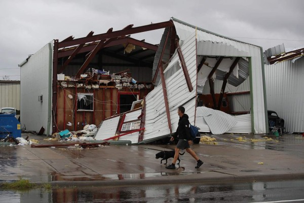 ROCKPORT, TX - AUGUST 26: A damaged building is seen after Hurricane Harvey passed through on August 26, 2017 in Rockport, Texas. Harvey made landfall shortly after 11 p.m. Friday, just north of Port Aransas as a Category 4 storm and is being reported as the strongest hurricane to hit the United States since Wilma in 2005. Forecasts call for as much as 30 inches of rain to fall in the next few days. Joe Raedle/Getty Images/AFP