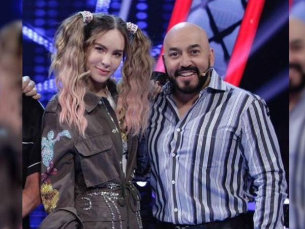 Los cantantes Lupillo Rivera y Belinda.
