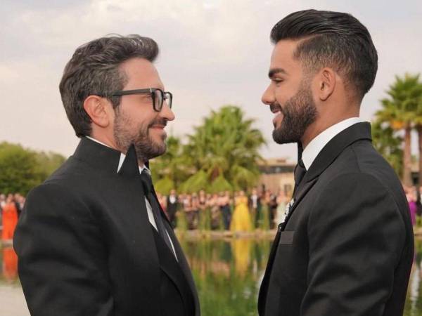 Carlos Adyan y su esposo Carlos Quintanilla.