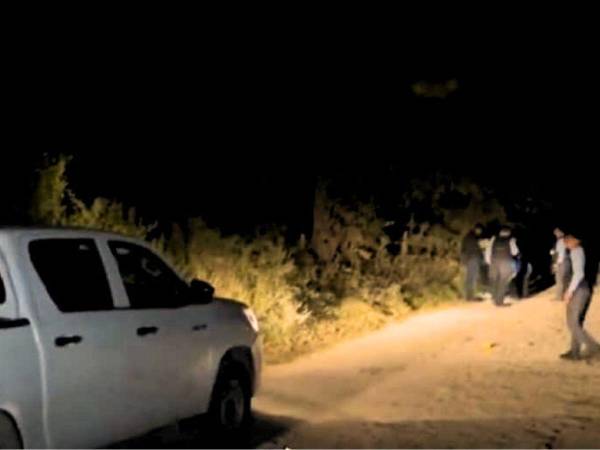 Agentes de la policía llegaron al sitio en el que fue hallado muerto Domínguez Bonilla.