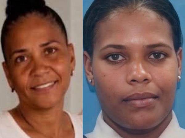 La profesora Rosa Marte y Mariely Figuereo Ramírez, sargento y esposa de uno de los hijos de la víctima.