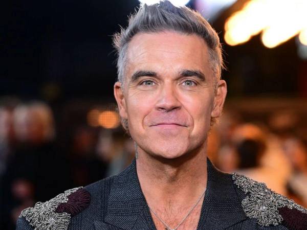 El cantante Robbie Williams.