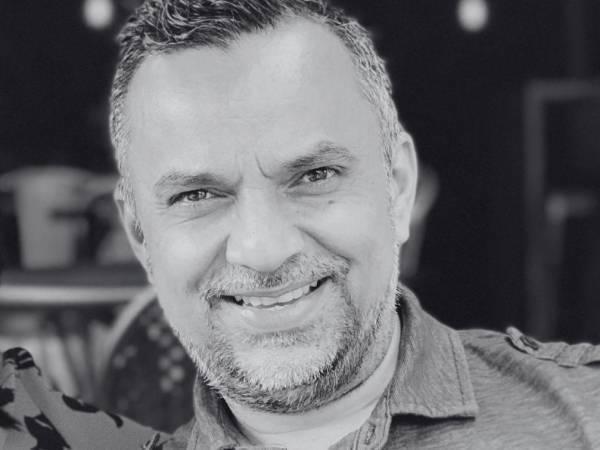 Dr. Carlos Coca Singh,