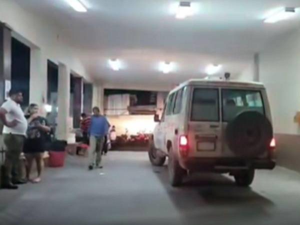 Ambulancia trasladando los heridos tras el atentado en Santa Rita, Copán.