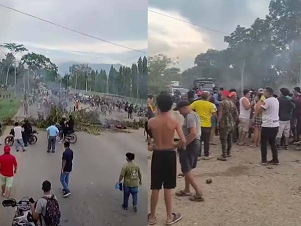 Largas filas de vehículos se registran en Naco, Cortés, debido a la protesta que mantiene bloqueado el paso hacia el occidente de Honduras.