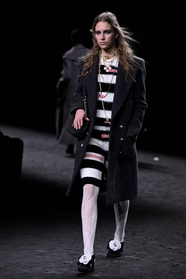 A model presents a creation from Chanel Womenswear Fall-Winter 2023-2024 collection during Paris Fashion Week in Paris, on March 7, 2023. (Photo by Emmanuel DUNAND / AFP)