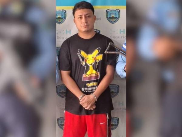 Momentos de la captura del imputado por agentes de la Policía Nacional.