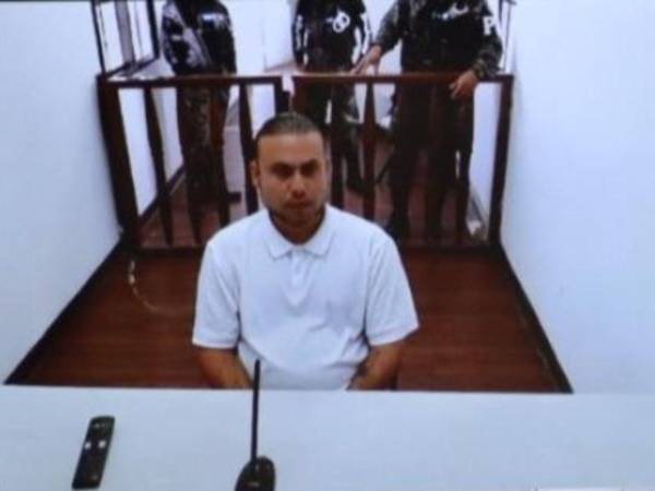 Gilbert Reyes está compareciendo en el juicio vía Zoom desde la cárcel de máxima seguridad donde se encuentra, por los delitos de<b> </b>asesinato y femicidio agravado en contra de su expareja y sus amigas.
