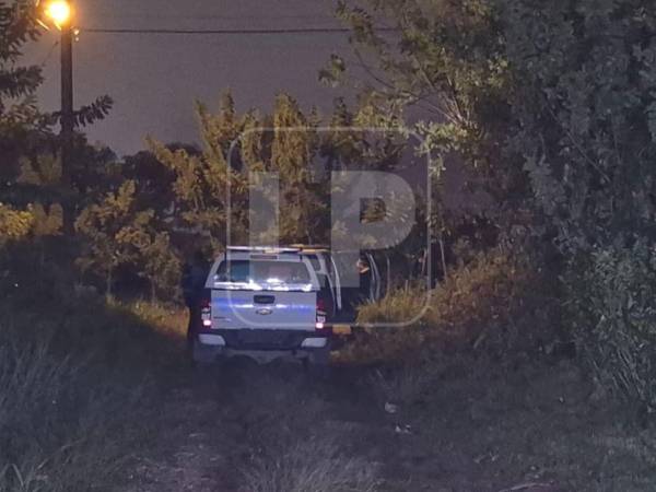 Vista de la escena del crimen en la colonia Lomas de Buenos Aires, en La Ceiba.