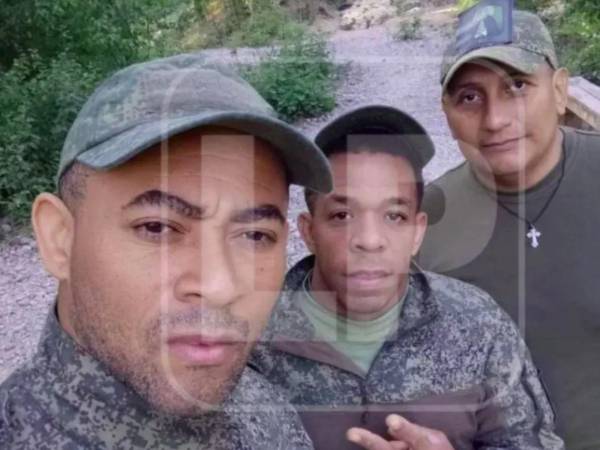Mario Roberto López (derecha) es uno de los casos de hondureños que fueron reclutados por los rusos.