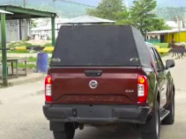 Los cuerpos del padre y su hijto de 18 meses fueron llevados a la morgue de Tegucigalpa.