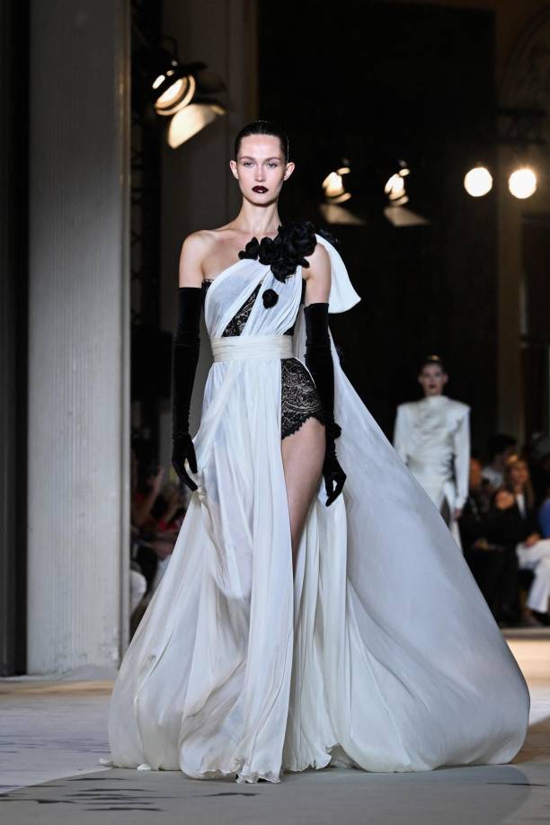 A model presents a creation by Zuhair Murad during the Women's Haute-Couture Fall/Winter 2023/2024 Fashion Week in Paris on July 5, 2023. (Photo by Anna KURTH / AFP)