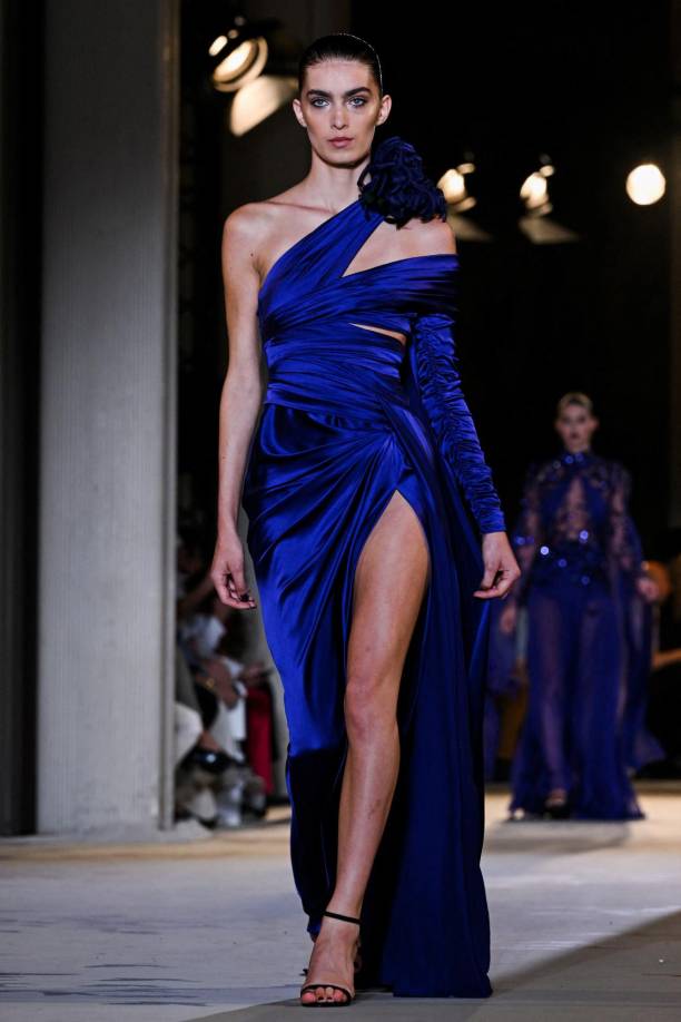 A model presents a creation by Zuhair Murad during the Women's Haute-Couture Fall/Winter 2023/2024 Fashion Week in Paris on July 5, 2023. (Photo by Anna KURTH / AFP)