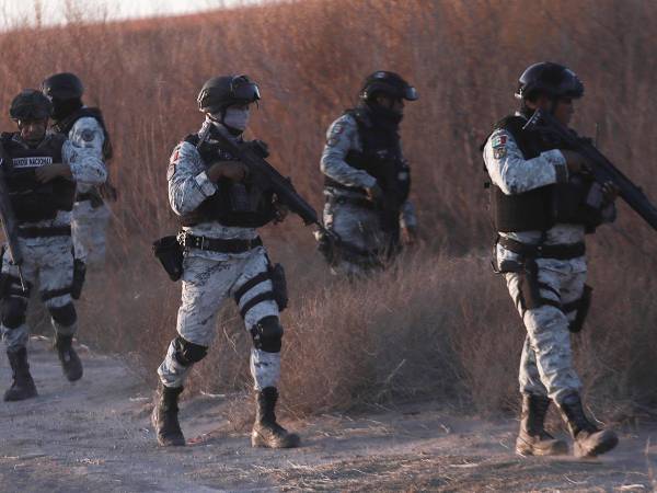 Miembros de la Guardia Nacional mexicana patrullan en Ciudad Juárez, México, el 5 de febrero. (Christian Chavez/Associated Press)