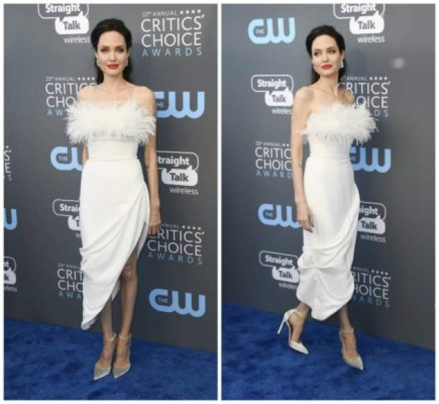 Angelina Jolie usó un vestido blanco de Ralph & Russo Couture con detalles de pluma en el busto y una abertura sexy en la pierna.<br/><br/>La directora de 'First they killed my father' exhibió una delgadez que preocupa a sus fans, su talla se ha visto reducida y esto se puede apreciar en sus hombros y pantorrillas.<br/><br/>