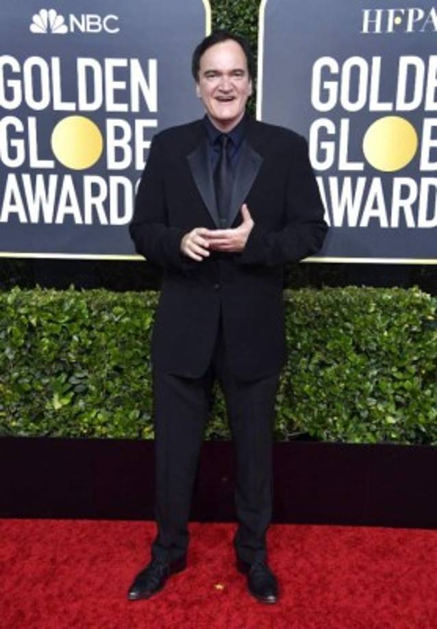 El cineasta Quentin Tarantino llegó solo mientras su esposa descansaba en casa para cuidar su embarazo.