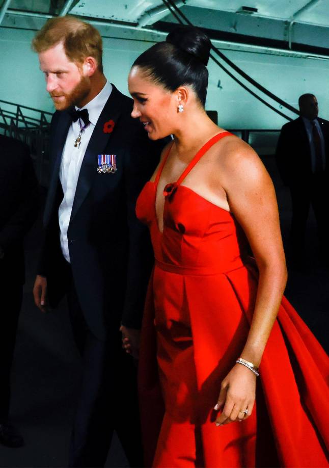 Britain's Prince William, Duke of Cambridge (L) and Britain's Catherine, Duchess of Cambridge (R) attend the annual Royal British Legion Festival of Remembrance at the Royal Albert Hall in London on November 13, 2021. (Photo by Geoff PUGH / POOL / AFP)