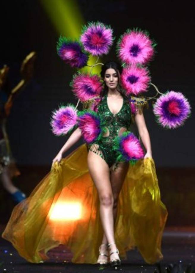 Francesca Mifsud, Miss Malta 2018 walks on stage during the 2018 Miss Universe national costume presentation in Chonburi province on December 10, 2018. (Photo by Lillian SUWANRUMPHA / AFP)