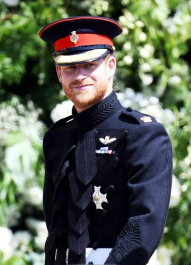 El príncipe Harry, Duque de Sussex, de Gran Bretaña, llega a la ceremonia de boda de la actriz estadounidense Meghan Markle en la Capilla de San Jorge, en el Castillo de Windsor.<br/>Chris Jackson / PISCINA / AFP