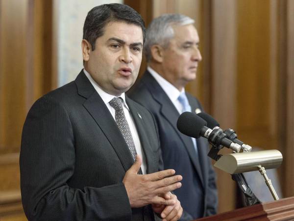 Fotografía de archivo del 24 de julio de 2014 del entonces presidente de Honduras, Juan Orlando Hernández, hablando durante una reunión en el Capitolio de Washington (Estados Unidos).