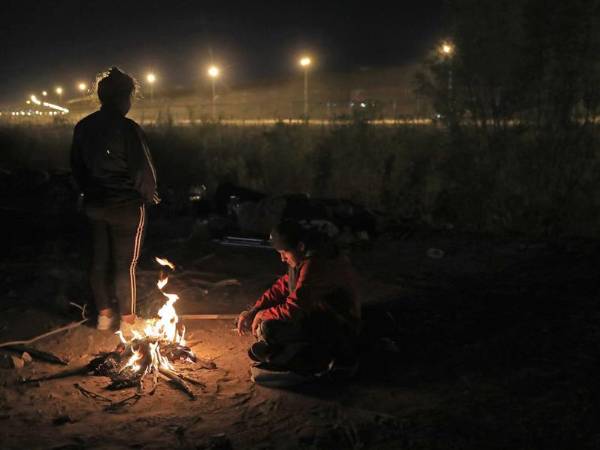 Inmigrantes en la frontera de México con Estados Unidos.