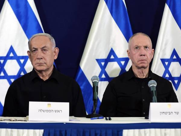 El primer ministro israelí, Benjamín Netanyahu, y su exministro de Defensa Yoav Gallant.