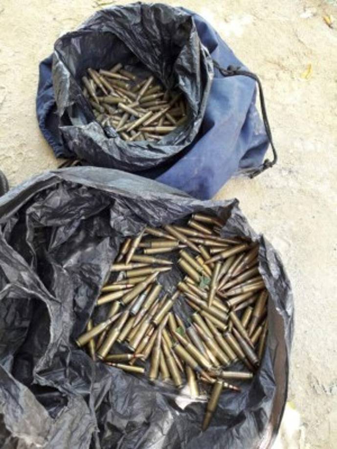Parte de las municiones decomisadas a los mareros en los operativos en El Negrito, Yoro.