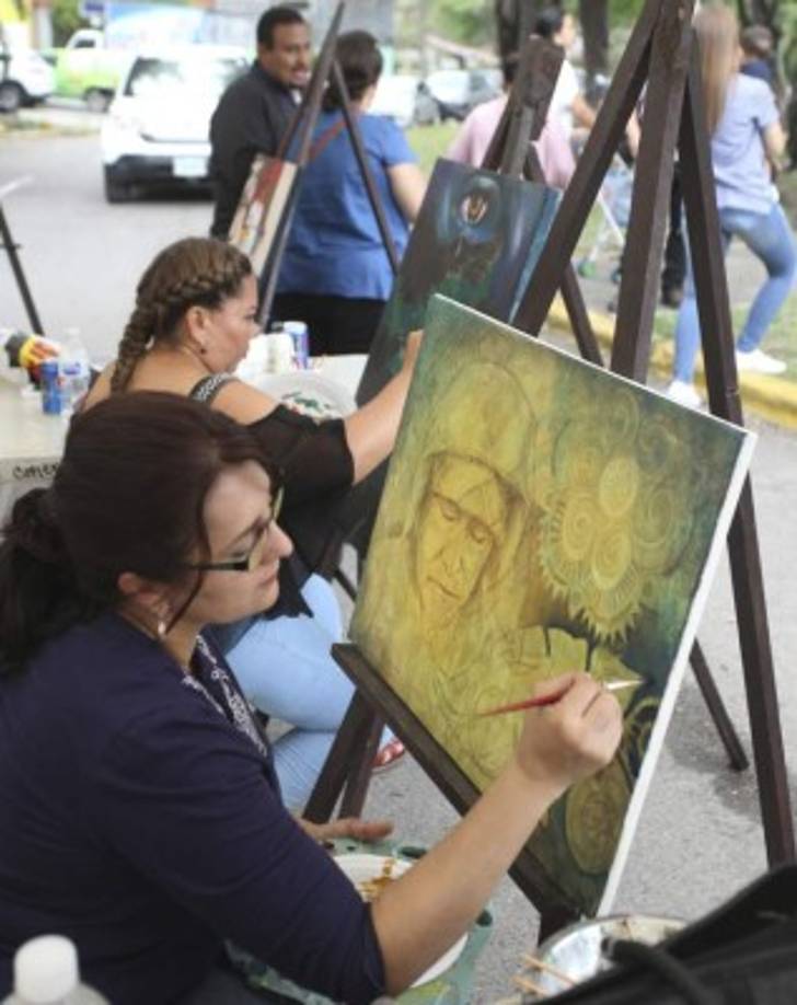 La plástica formó parte de la ocasión y los pintores se mezclaron con los comensales.