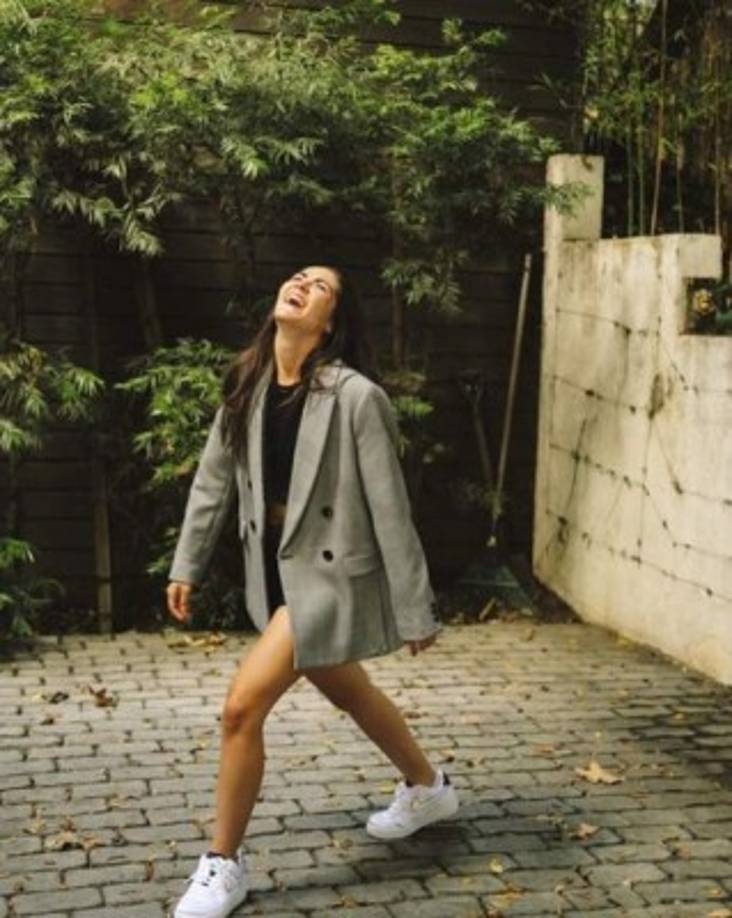 Durante 2012, realizó el papel de antagonista en Los juegos del hambre, interpretando el papel de Clove, la tributo femenino del Distrito 2 y la mayor enemiga de la protagonista, Katniss Everdeen.