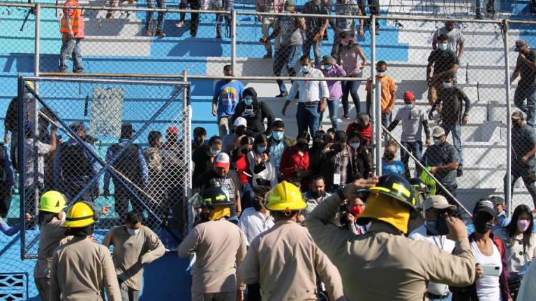 Momentos del simulacro de emergencias en el estadio Nacional.