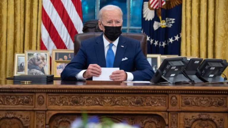 Biden firmó ayer varios decretos migratorios para acelerar la naturalización de millones de inmigrantes./AFP.