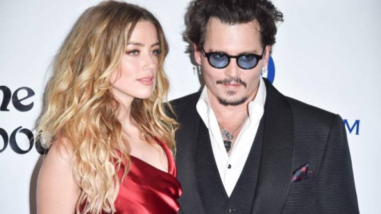 En la entrevista Johnny prefirió ignorar el problema legal que tiene por su divorcio de Amber Heard.