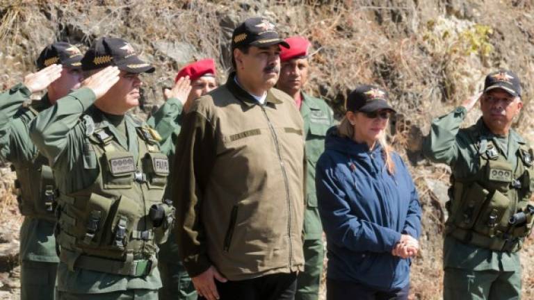 El presidente Nicolás Maduro asistiendo a unos ejercicios militares. Foto: AFP/Presidencia venezolana
