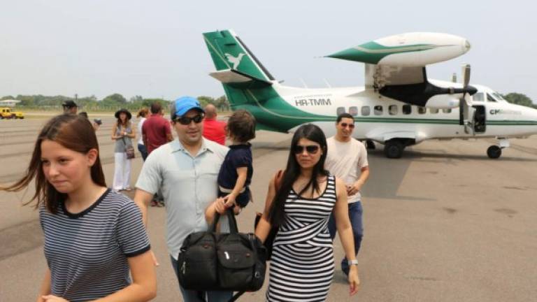 Los turistas viajaron en CM Airlines de Tegucigalpa a Tela.