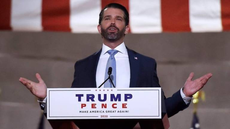 Donald Trump Jr. speaks during the first day of the Republican convention at the Mellon auditorium on August 24, 2020 in Washington, DC. (Photo by Olivier DOULIERY / AFP)
