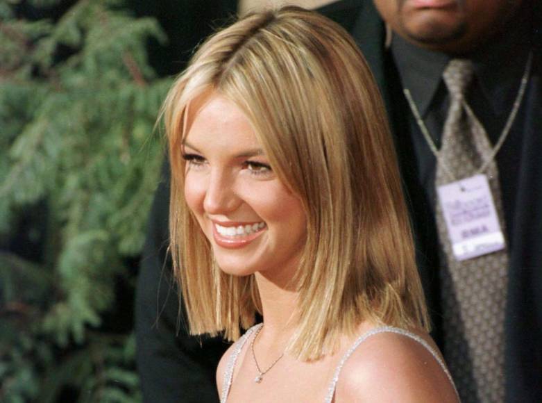 Dos décadas después de decir que perdió su virginidad con el cantante Justin Timberlake, Britney Spears admitió que tuvo relaciones sexuales por primera vez cuando era una estudiante de secundaria, a los 14 años. Fotografía de archivo de Britney Spears en 1999, cuando tenía años.
