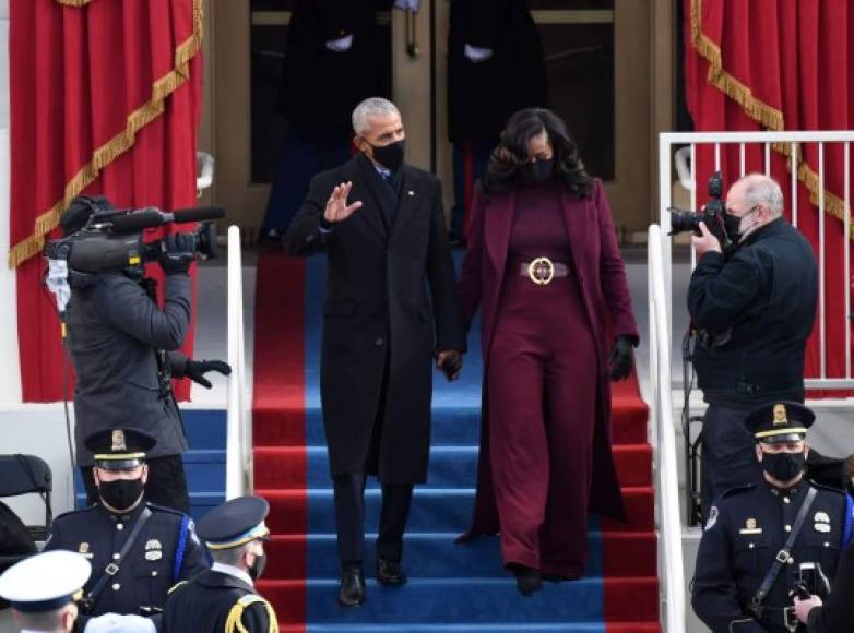 Former US President Barack Obama and former US First Lady Michelle Obama arrive for the inauguration of Joe Biden as the 46th US President on January 20, 2021, at the US Capitol in Washington, DC. (Photo by ANDREW CABALLERO-REYNOLDS / AFP)