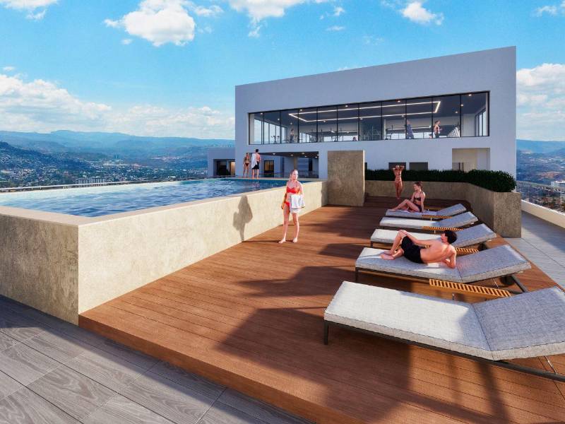 Área de piscina en Aluna Tower.